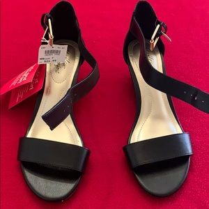 Black wedges shoes size 7 . Brand new never worn.